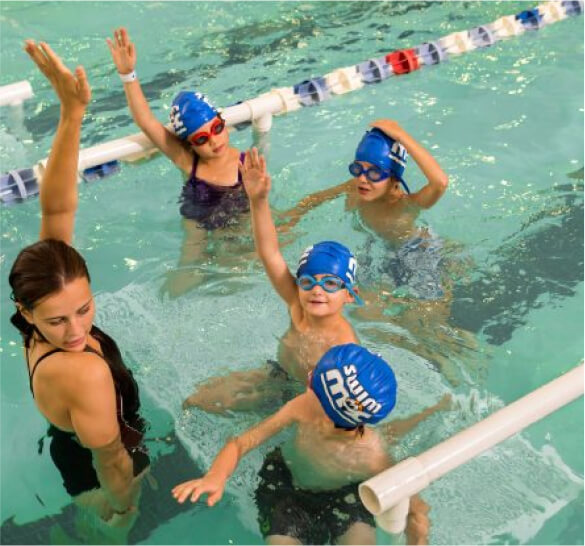 Instructor teaching swim lessons