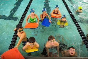 group of kids in the pool